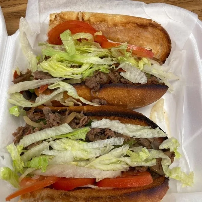 Steak subs with lettuce and tomato
